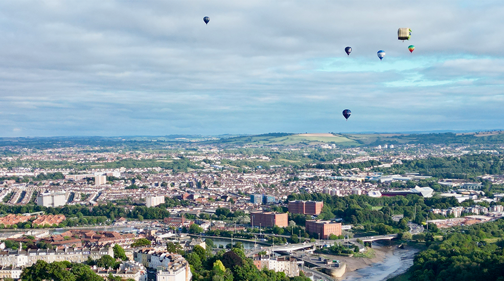 Hot air balloons flying over the city of Bristol